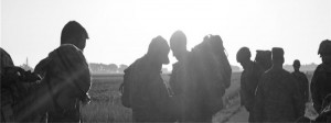 Soldiers prepare for a long walk.